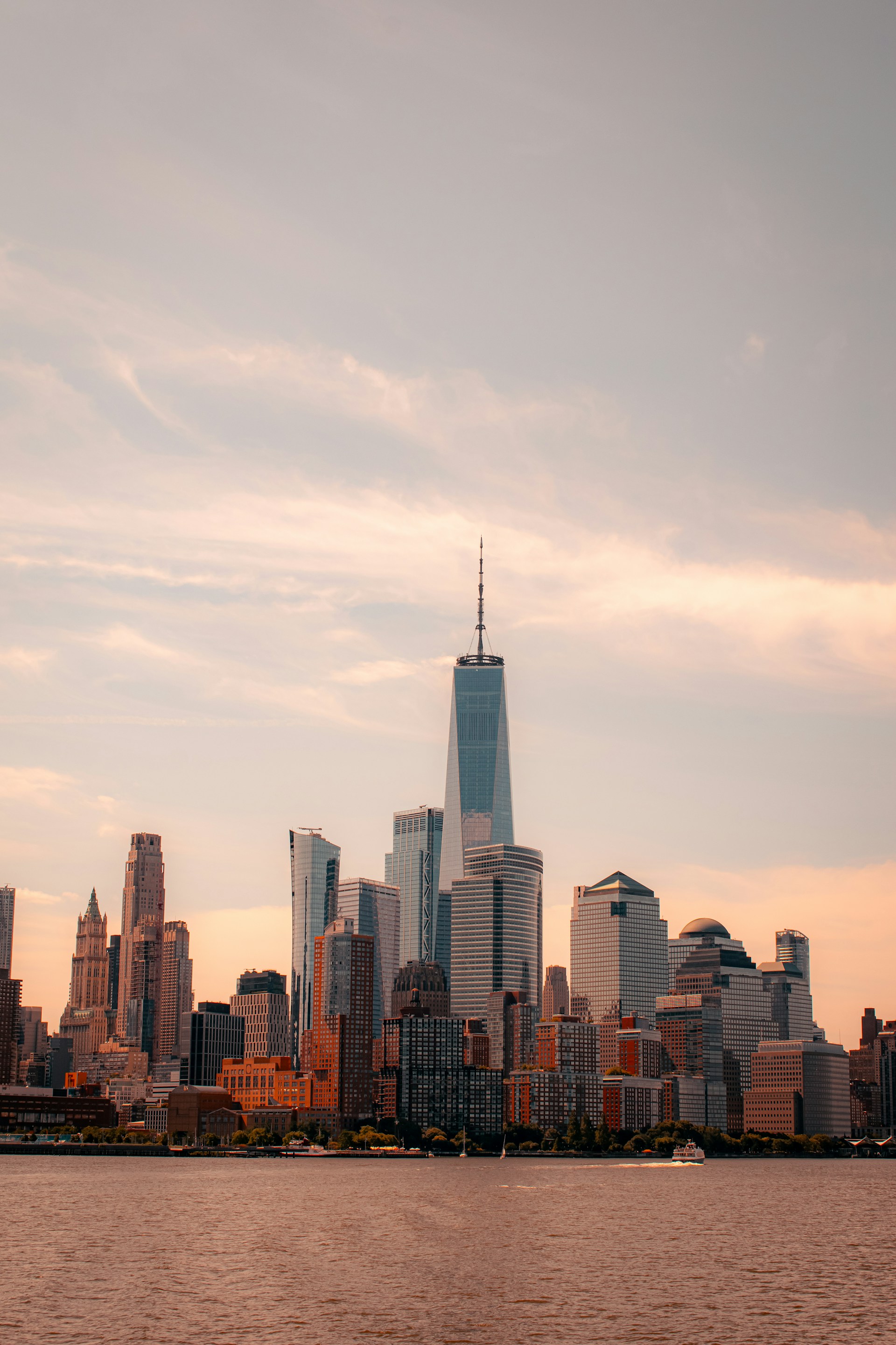 Manhattan skyline at sunset viewed from the water