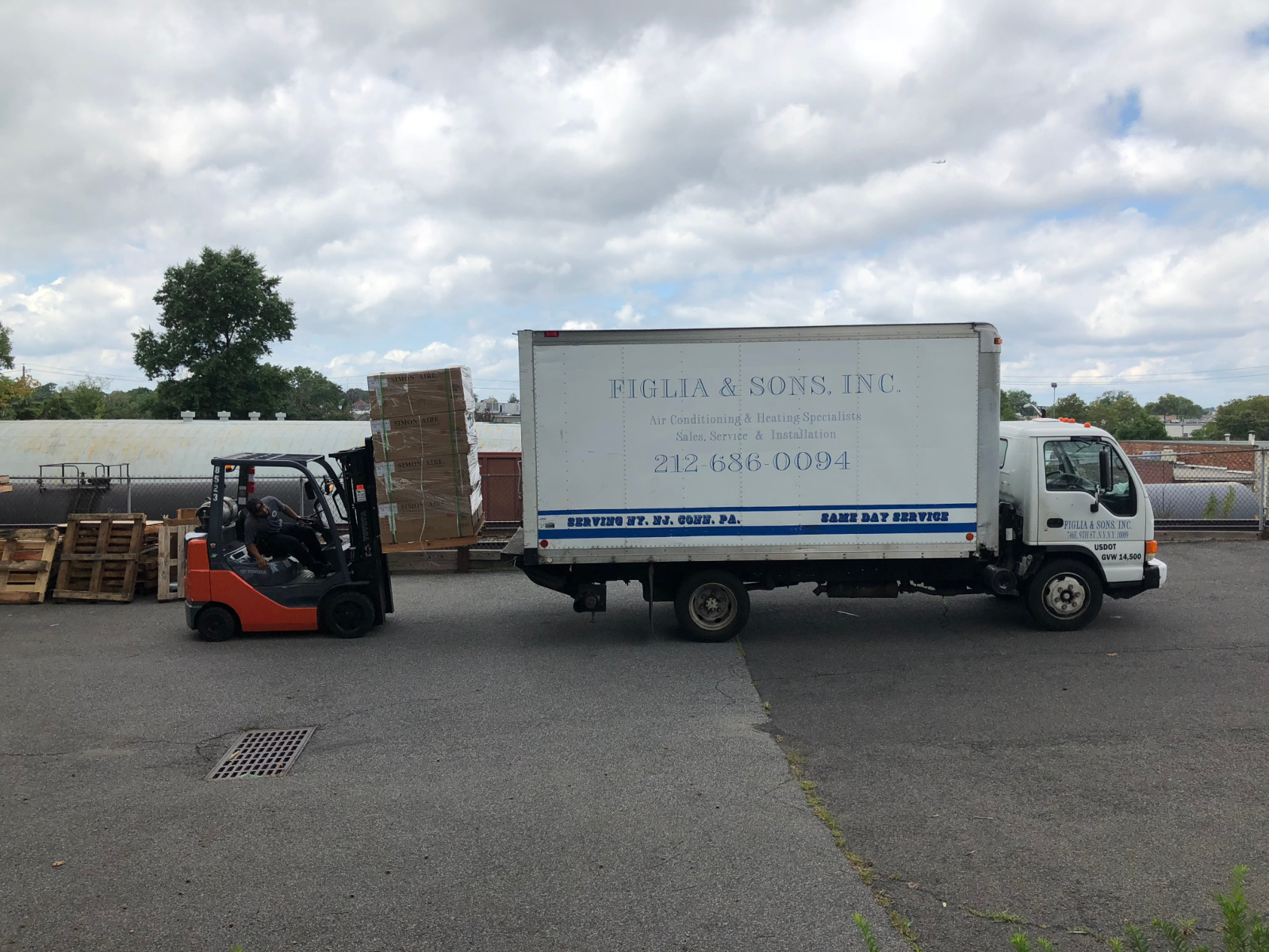 Figlia and Sons truck being loaded at warehouse yard